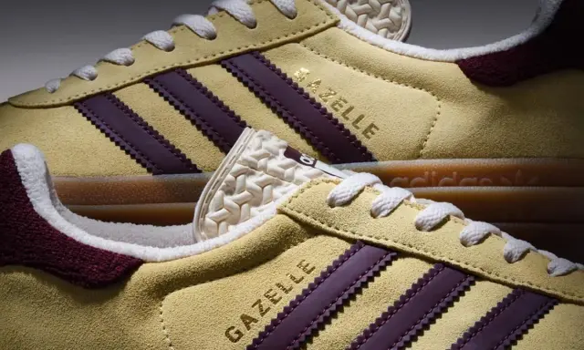 Żółte **modele butów adidas z lat 90.** Gazelle z bordowymi paskami i białymi sznurówkami.